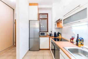 Kuchyňa alebo kuchynka v ubytovaní Great Homes