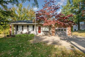 a small white house with a red door at Ashwood Arbor 3 bed 2 bath sleeps 8 in Olde West Chester