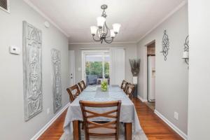 a dining room with a table and chairs at Ashwood Arbor 3 bed 2 bath sleeps 8 in Olde West Chester +12 photos