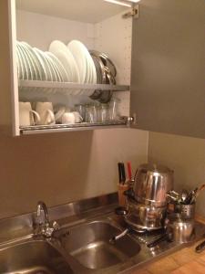 Kuchyň nebo kuchyňský kout v ubytování Atmosfere Rinascimentali + 34 fotografií