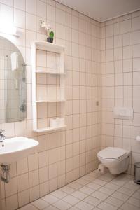 A bathroom at Palads Hotel