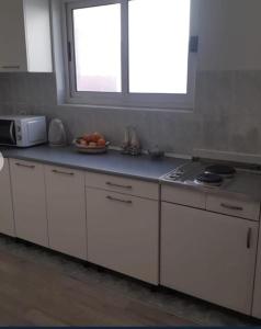 Η κουζίνα ή μικρή κουζίνα στο Apartman Andrea