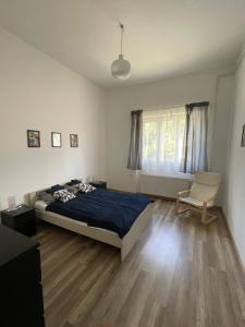 Posteľ alebo postele v izbe v ubytovaní Harmath-Szabó Apartman
