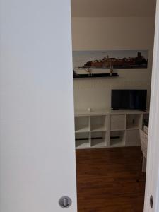 A television and/or entertainment centre at Dimora 14
