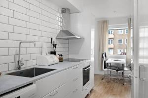 Kuchyň nebo kuchyňský kout v ubytování Central apartment Eslöv! 20 km from Lund