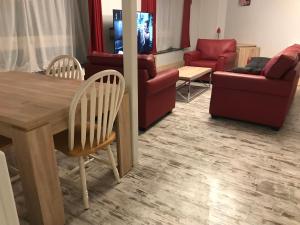 Posezení v ubytování Loc-Appart SPM Chambre d'hôtes 3