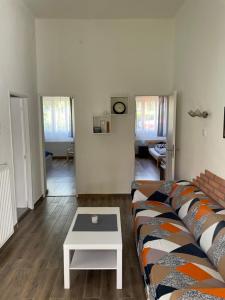 Posteľ alebo postele v izbe v ubytovaní Harmath-Szabó Apartman