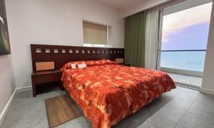 Postel nebo postele na pokoji v ubytování Rosarito Beach Hotel
