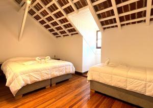 Cama o camas de una habitación en La Casa del Balcón