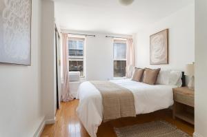 Postel nebo postele na pokoji v ubytování Top Location! 2BD in Kips Bay, NYC Best Neighborhood