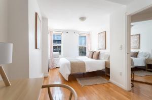 Postel nebo postele na pokoji v ubytování Top Location! 2BD in Kips Bay, NYC Best Neighborhood