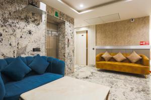 Ruang duduk di Super Townhouse Oak Hisar