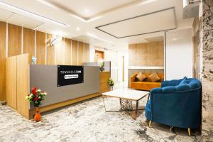 Ruang duduk di Super Townhouse Oak Hisar +27 gambar