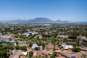 an aerial view of a town with mountains in the background at Grandview Guesthouse in Cape Town +41 photos