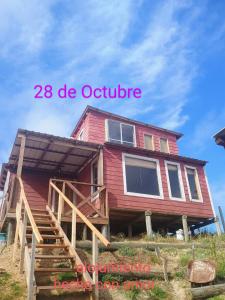 a house is being built on the beach at 28 de Octubre in Punta Del Diablo