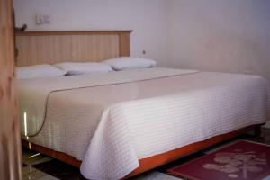 Postel nebo postele na pokoji v ubytování Manhattan hotel