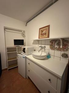 Kuchyň nebo kuchyňský kout v ubytování P4D room + 1 fotografie