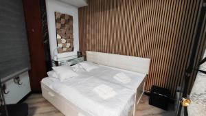 Ein Bett oder Betten in einem Zimmer der Unterkunft Terrasa de Mercado Central