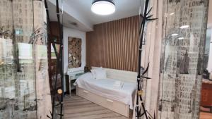 Ein Bett oder Betten in einem Zimmer der Unterkunft Terrasa de Mercado Central