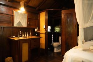 Phòng tắm tại Canto Leela Eco Bungalows +60 ảnh