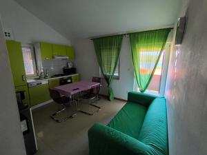 Η κουζίνα ή μικρή κουζίνα στο Apartments Pongrac