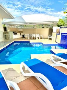 Πισίνα στο ή κοντά στο Luxury House on Clifton Beach with Heated Saltwater Swimming Pool