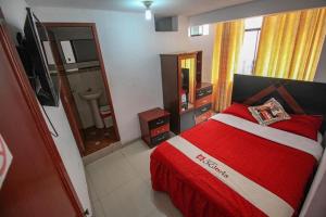 Postel nebo postele na pokoji v ubytování Hotel D'Gloria