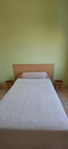 Postel nebo postele na pokoji v ubytování Casa Tota
