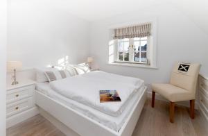 Postel nebo postele na pokoji v ubytování LITZKOW 11301