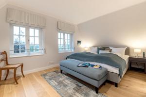 En eller flere senge i et værelse på LITZKOW 14205