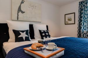 En eller flere senge i et værelse på LITZKOW 14702