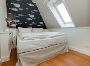 En eller flere senge i et værelse på LITZKOW 15509