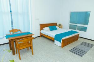 Postel nebo postele na pokoji v ubytování Phoenix house ahangama + 37 fotografií