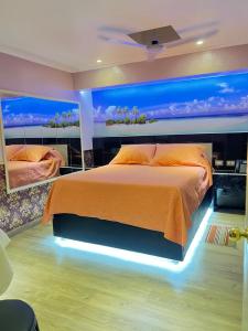 Postel nebo postele na pokoji v ubytování Hotel Santiago Yungay