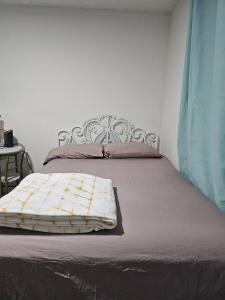 Katil atau katil-katil dalam bilik di The Sample Rd Retreats