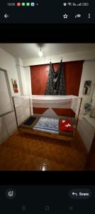 Ένα ή περισσότερα κρεβάτια σε δωμάτιο στο Apollo Hostel