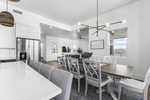 a kitchen and dining room with a table and chairs at Villa #22 at Bloomington Country Club - Fairway to Heaven condo in St. George +37 photos