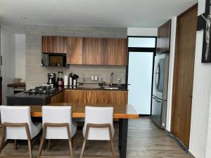 Η κουζίνα ή μικρή κουζίνα στο Residencial entre Viñedos