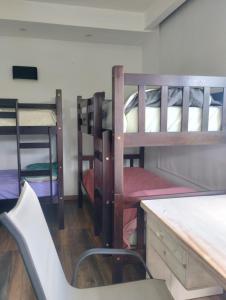 Μία ή περισσότερες κουκέτες σε δωμάτιο στο Descanso ideal