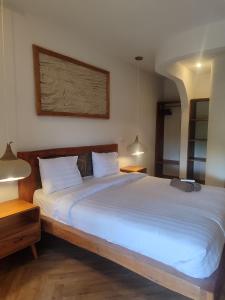 Little Elephant Cottage客房内的一张或多张床位