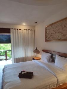 Little Elephant Cottage客房内的一张或多张床位