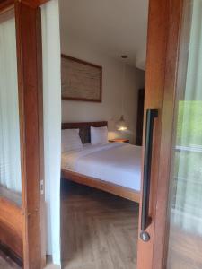 Little Elephant Cottage客房内的一张或多张床位