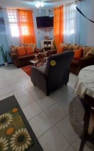 Posezení v ubytování Peaceful Nest Apt 3