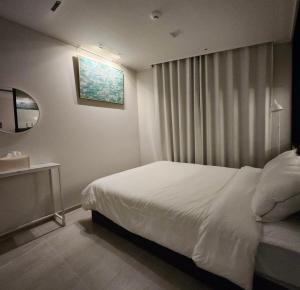 Gallery image ng #광안대교#오션뷰헬스장&사우나#무료주차#해변도보3분#넷플릭스#밀락더마켓 sa Busan