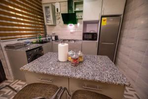 Cuisine ou kitchenette dans l'établissement Agape Villa