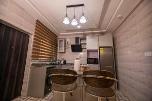 Cuisine ou kitchenette dans l'établissement Agape Villa