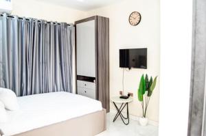 Ένα ή περισσότερα κρεβάτια σε δωμάτιο στο Furnished one-bedroom bungalow in a secure and serene part of Ibadan