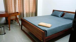 Postel nebo postele na pokoji v ubytování eCASA Home Stay