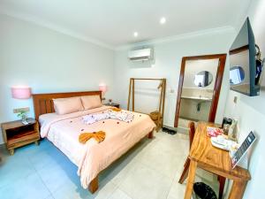 Muni Residence & Spa客房内的一张或多张床位