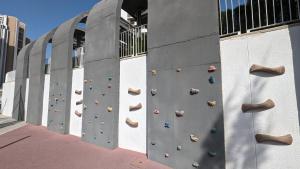 a climbing wall in a building with climbing equipment at SUNSET WAVES sea & sky apartment in Benidorm